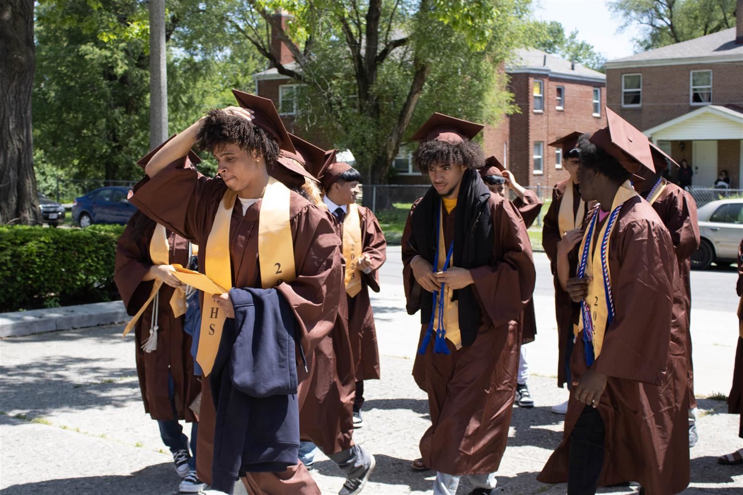 students in caps and gowns