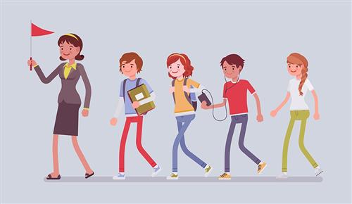 Tour guide with flag leading students