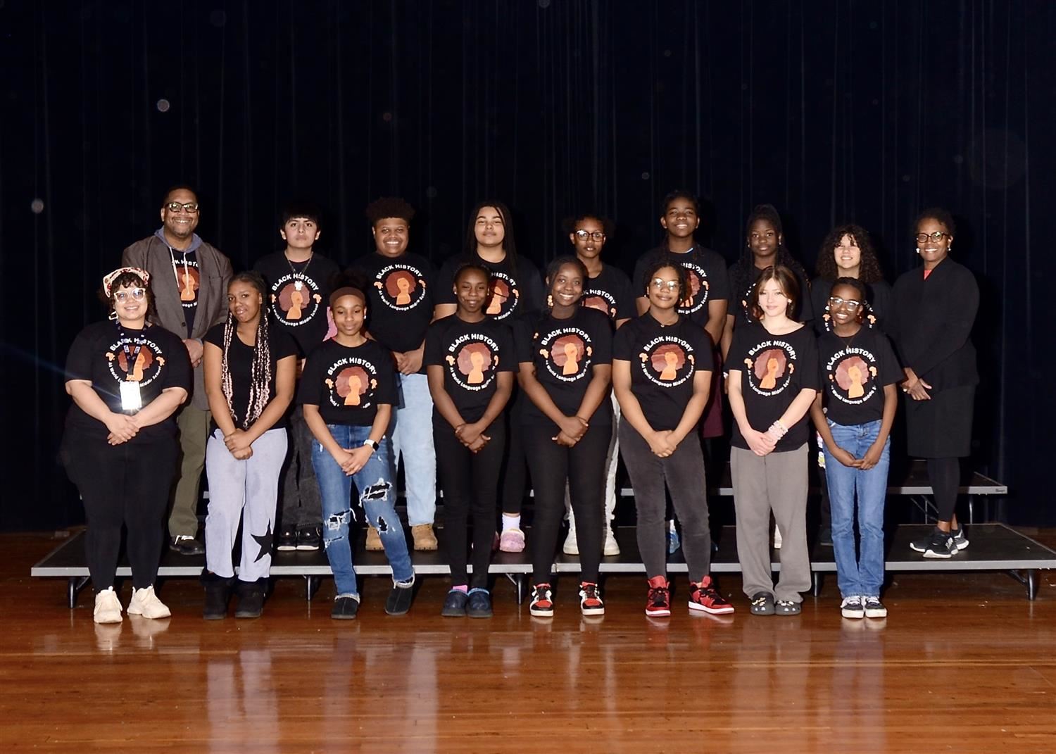 group of students standing in two lines