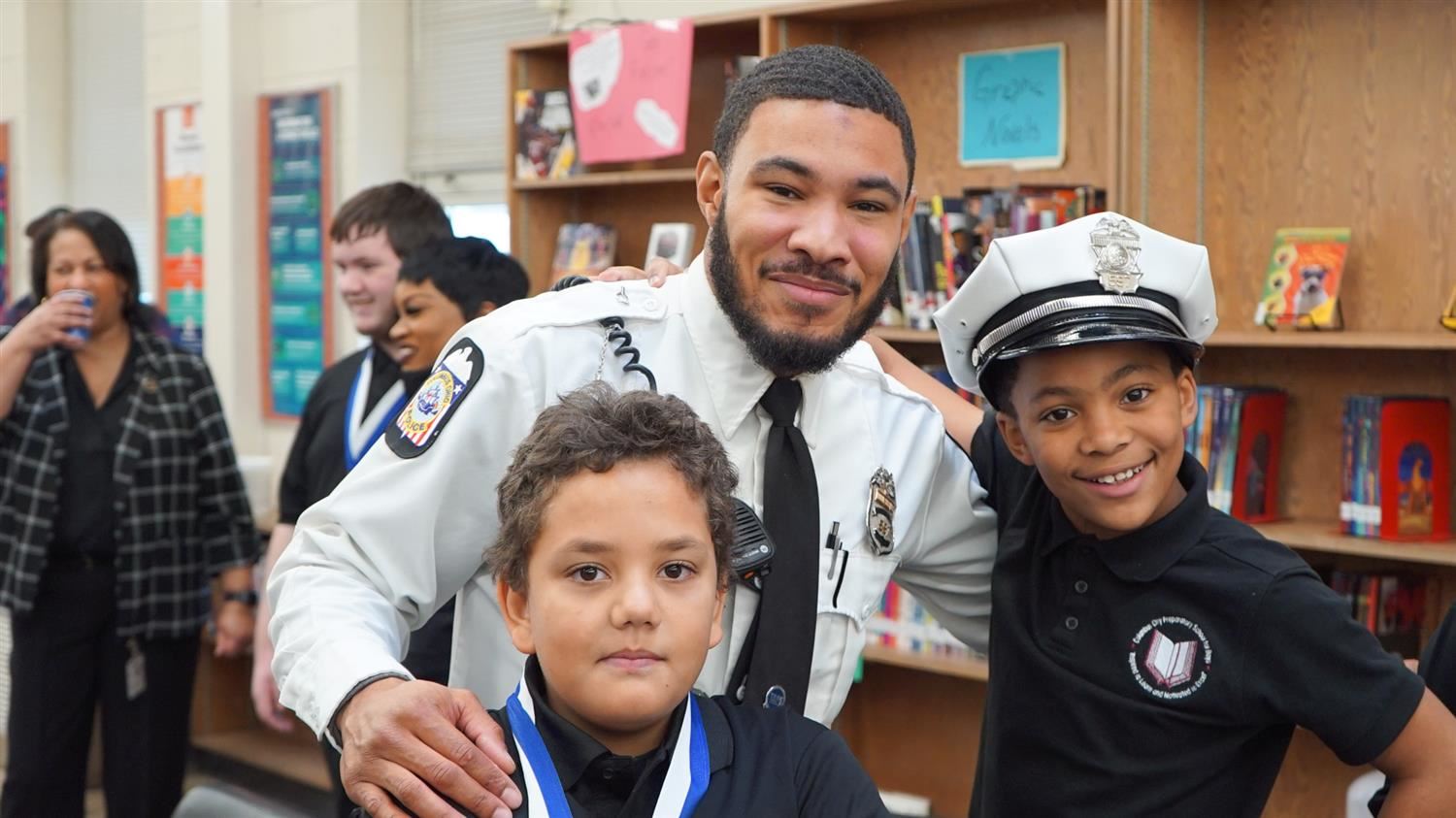 TAPS officer with students