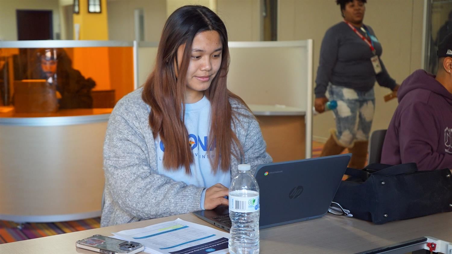 Student working at laptop