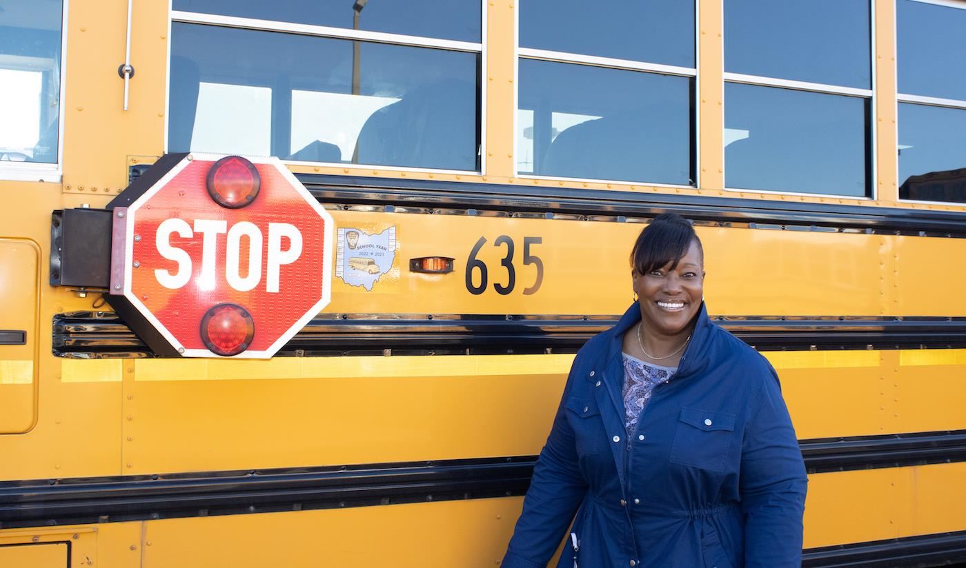 Gwendolyn Harper outside bus