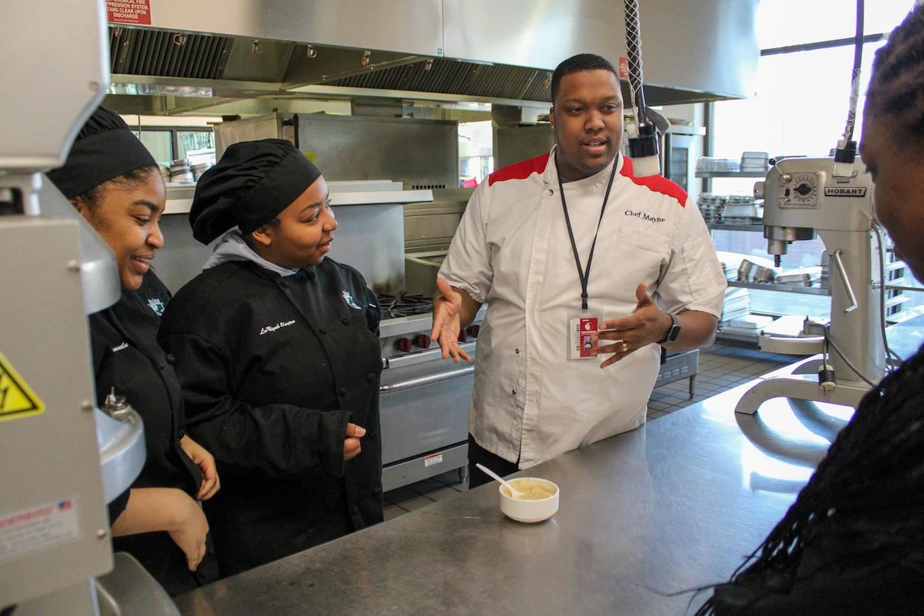 Jermayne Harris with students