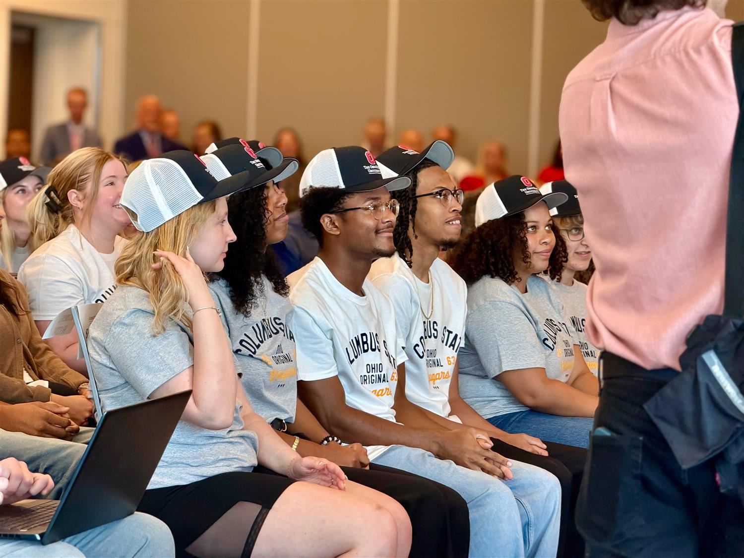 students looking in crowd