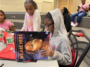 girls reading book
