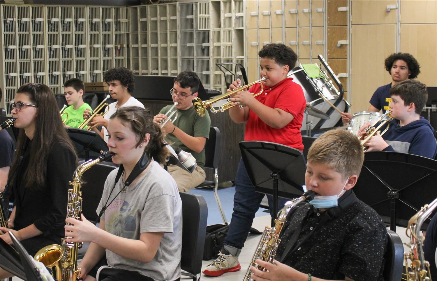 Students play band instruments