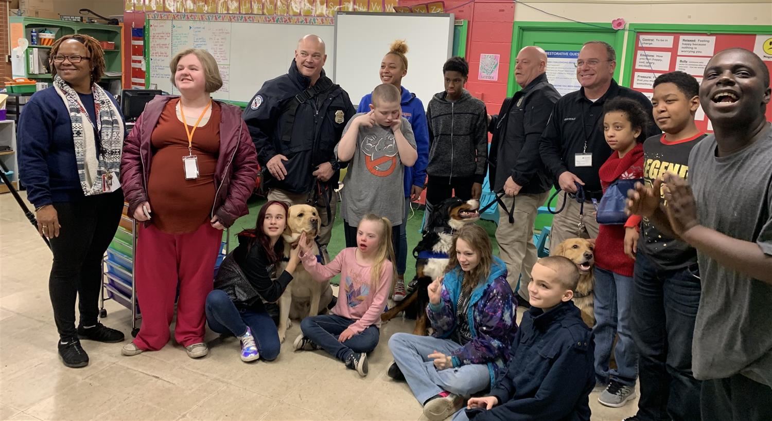 Students with therapy dogs 