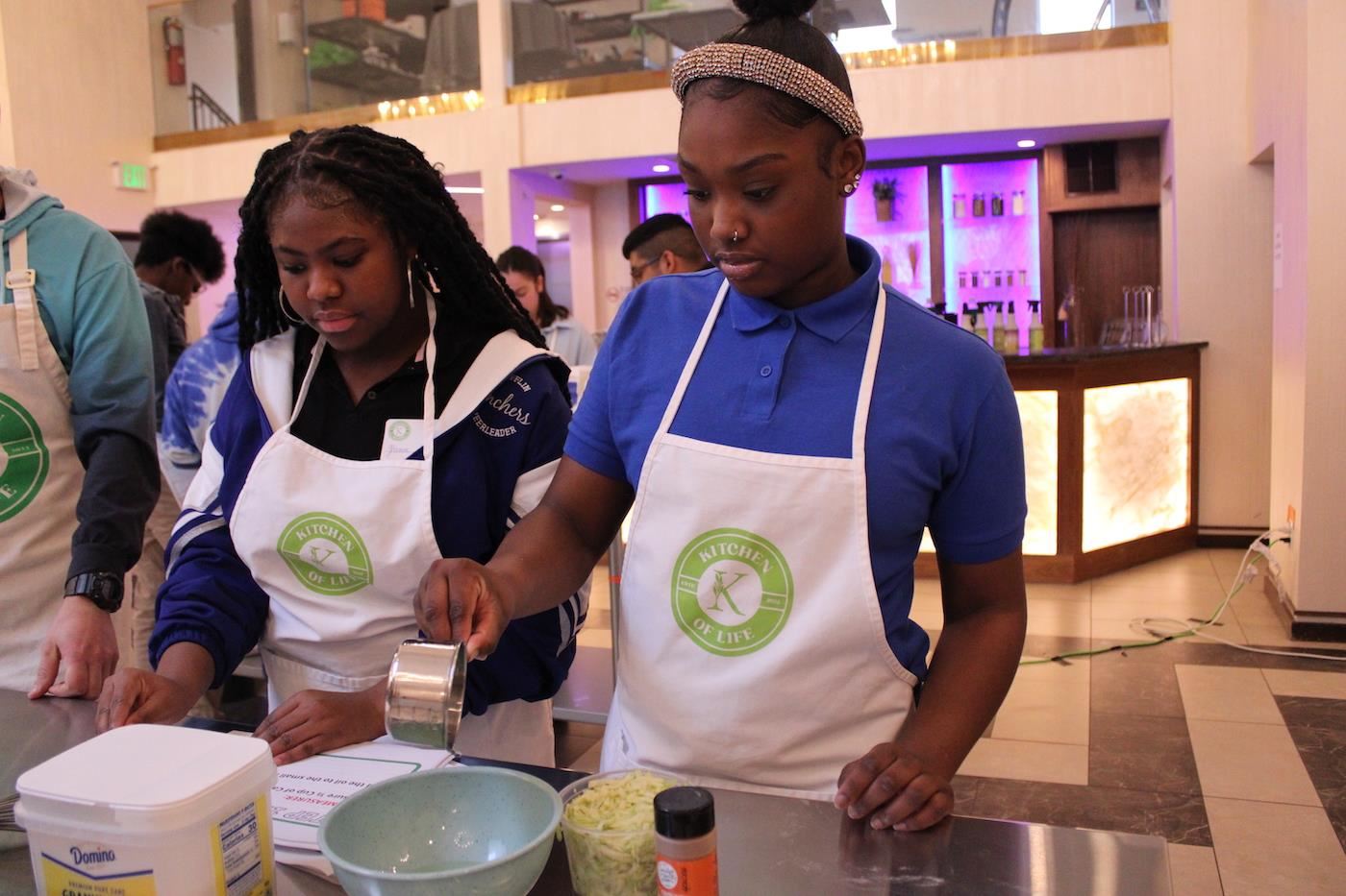 Students cooking at Kitchen of Life