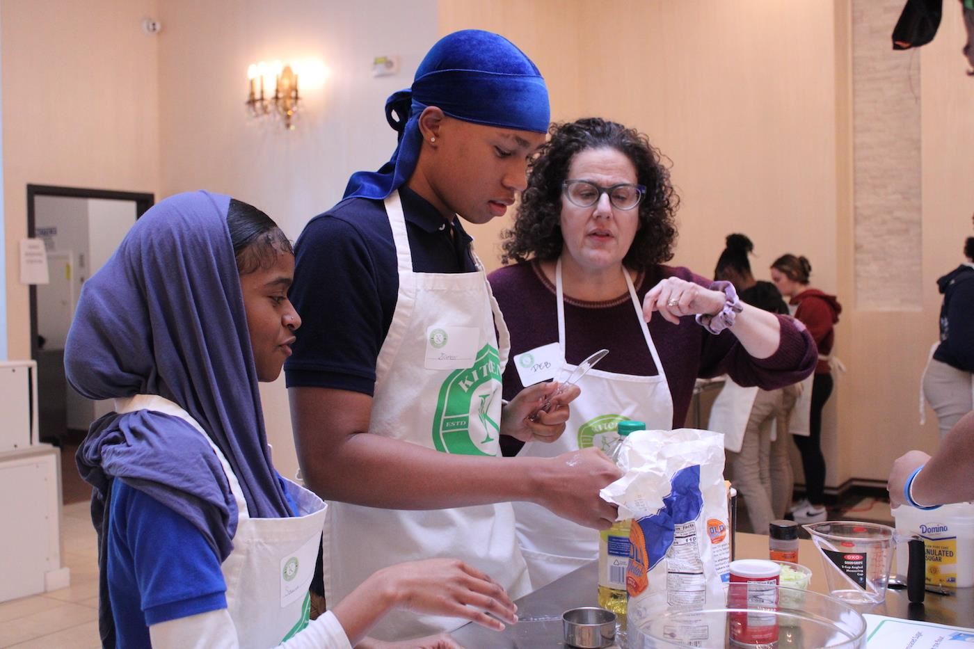 Students cooking at Kitchen of Life