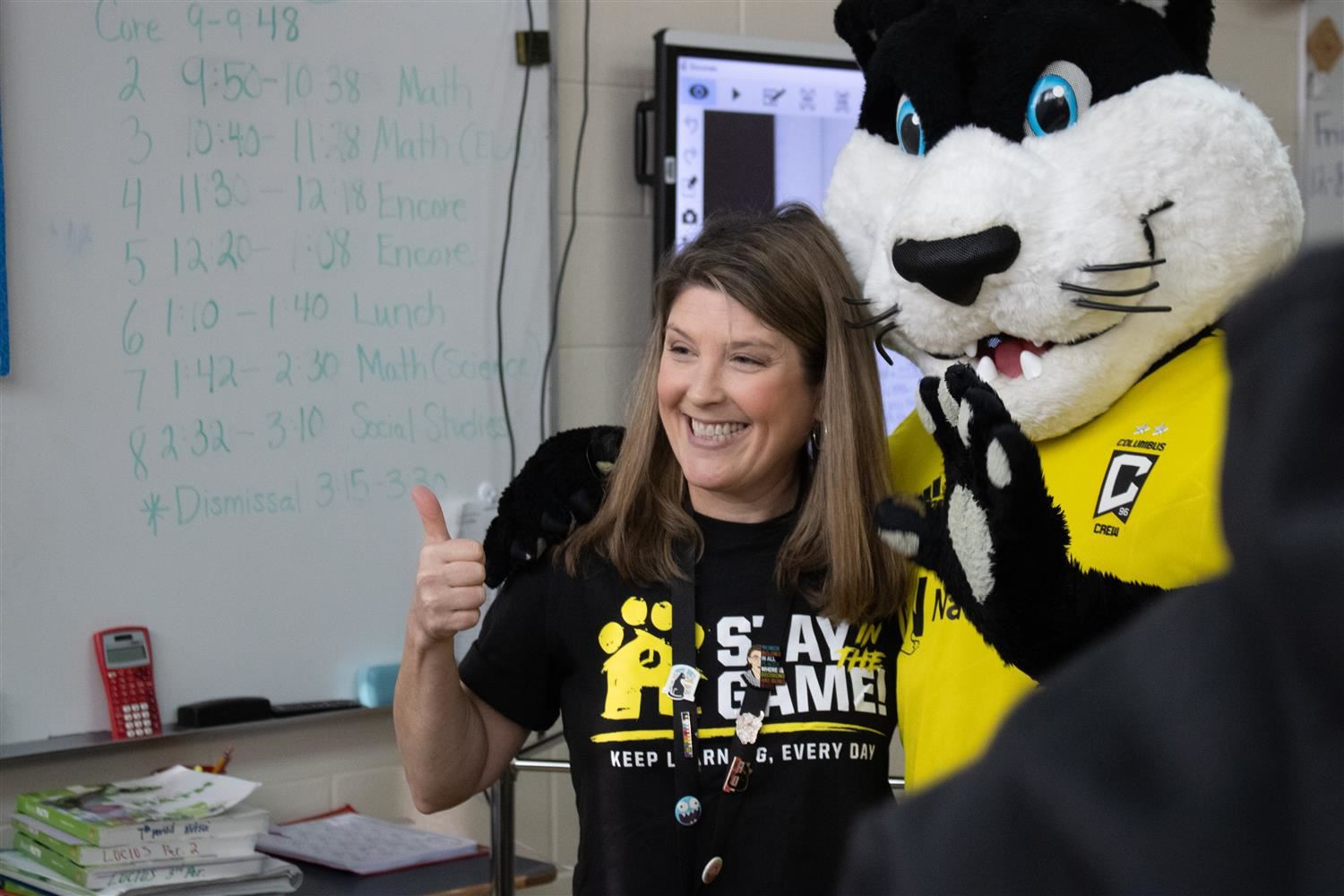 teacher with mascot