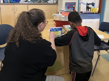Student working on Peace Room