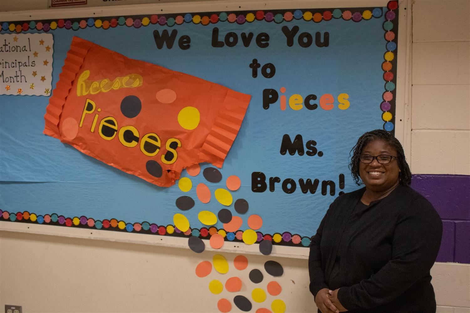 Woman by a bulletin board