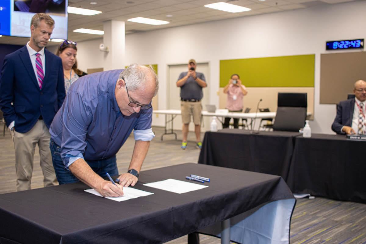 John Coneglio Signing Contract