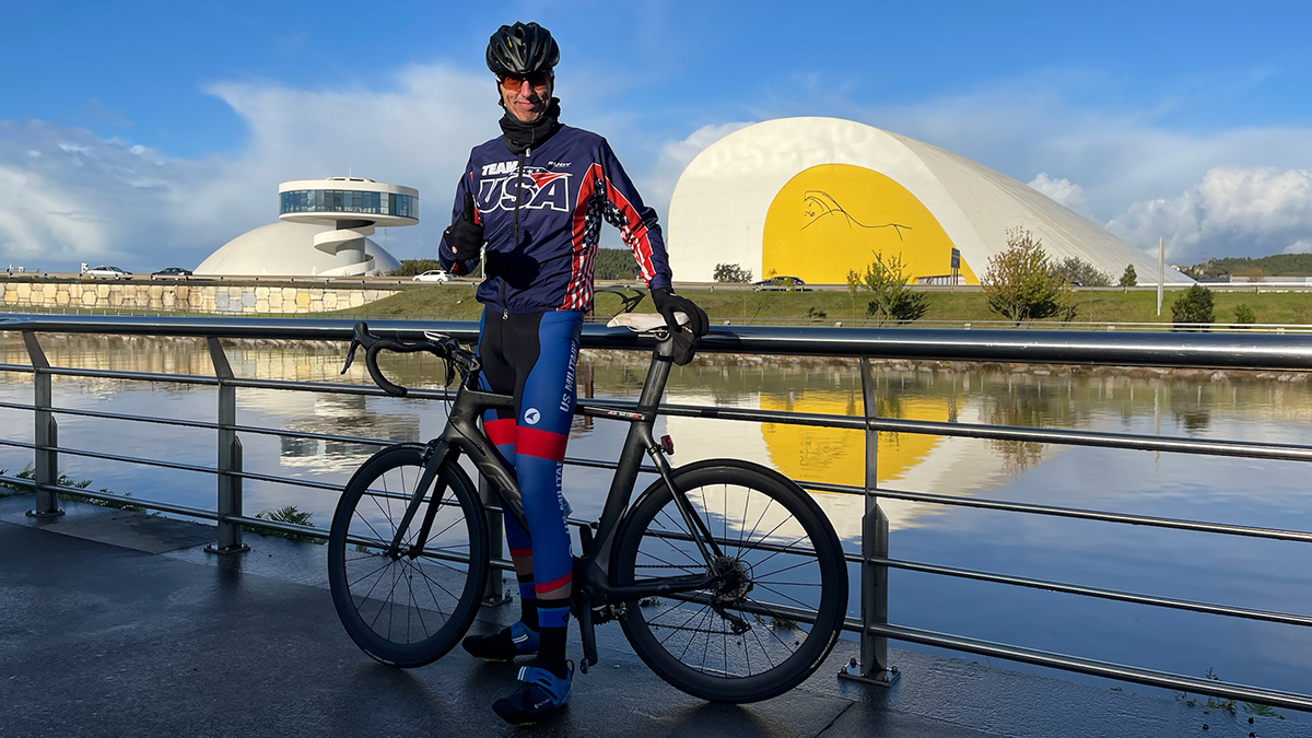 Dr. Don Cain poses for a photo with his bike