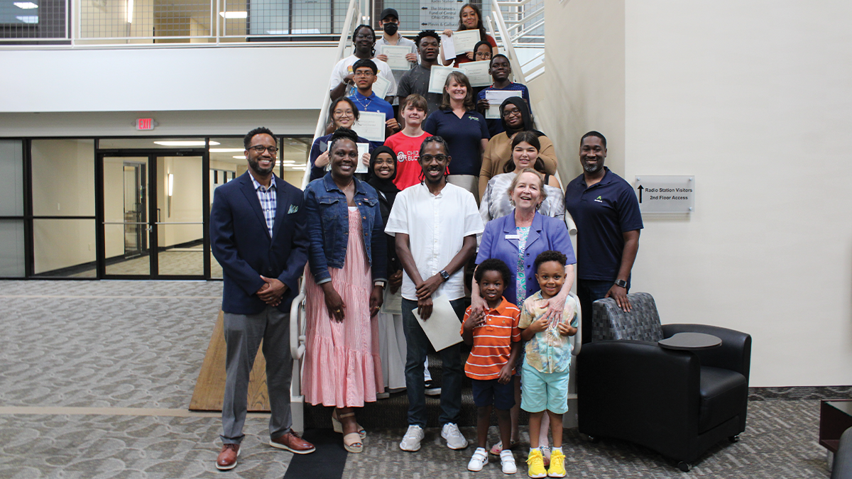 Group photo of community leaders and CCS student interns